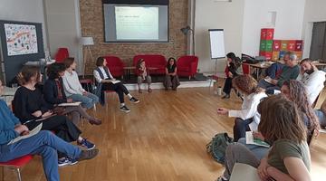 A group of people at a workshop discussing values
