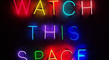 Sign saying 'watch this space'