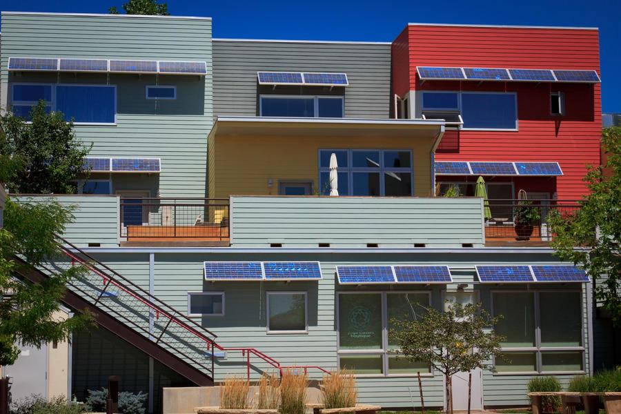 Photo credit: www.solardave.com Solar panels on apartment roofs