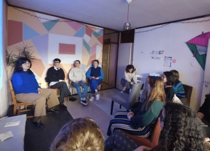 The incubator space in Rotterdam, people meet in a cricle in a indoor space