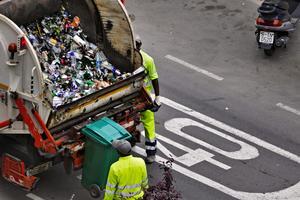 Refuse collectors at work Refuse collectors at work