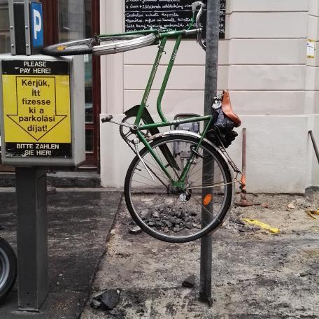 Bike hanging on a pole
